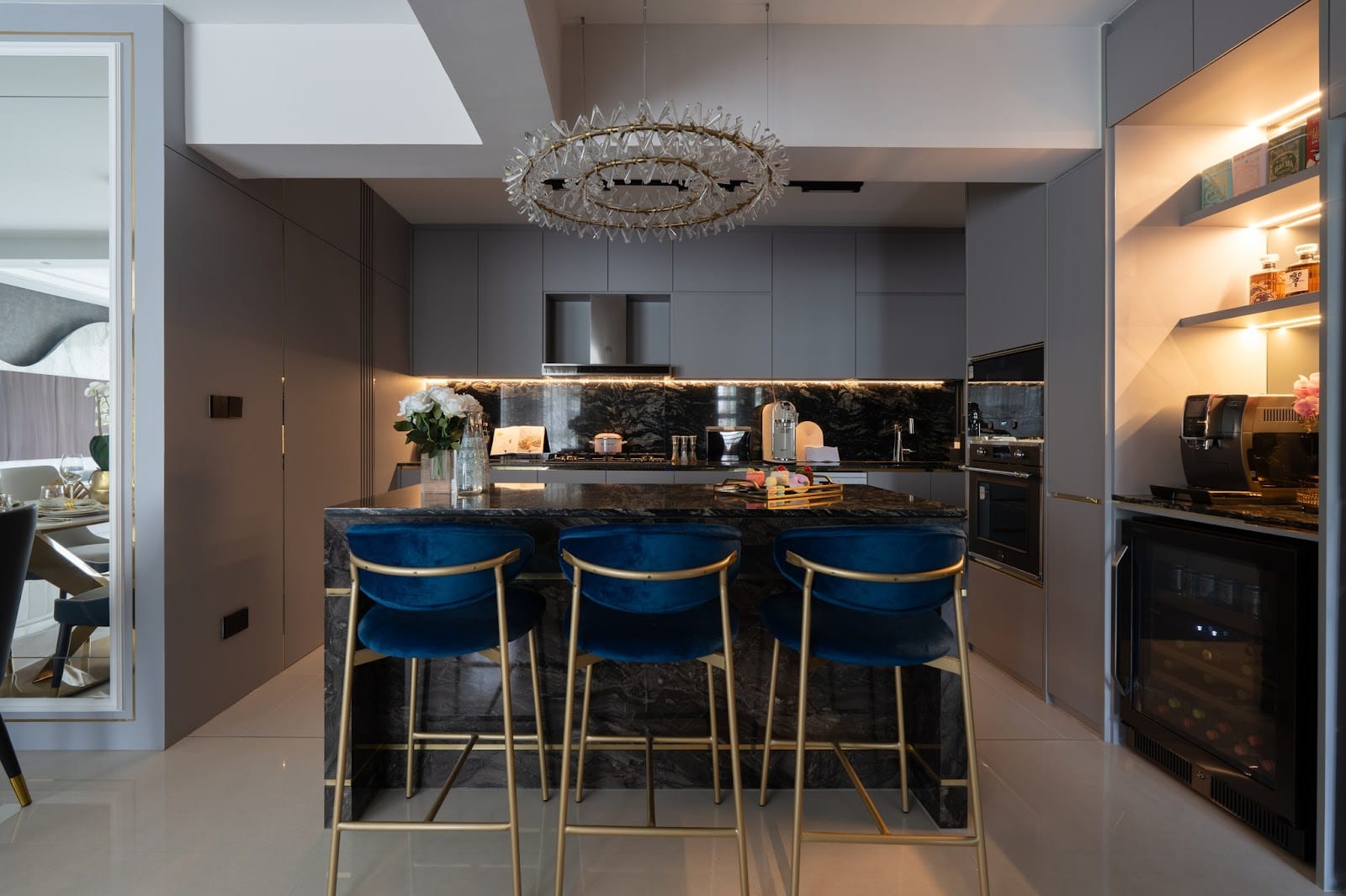 Architectural custom fluted joinery and kitchen island craftsmanship in Singapore luxury apartment